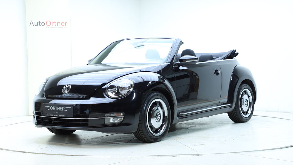 VW Beetle Cabrio 1,2 TSI BMT Cup 3 Jahre Garantie, Baujahr 2014, Seitenansicht — Auto Ortner Villach