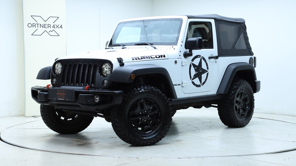 Jeep Wrangler Rubicon X 10th Anniversary Edition #276, Baujahr 2014, Seitenansicht — Auto Ortner Villach